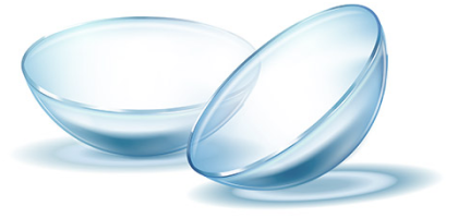 contact lenses Two contact lenses lying down on a transparent surface